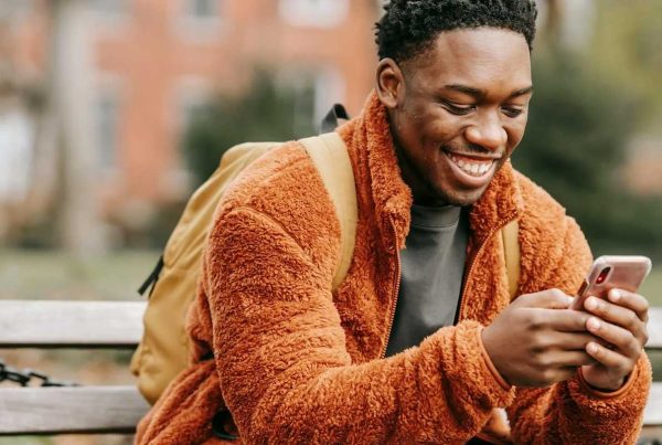 Man enjoying UX design on mobile phone